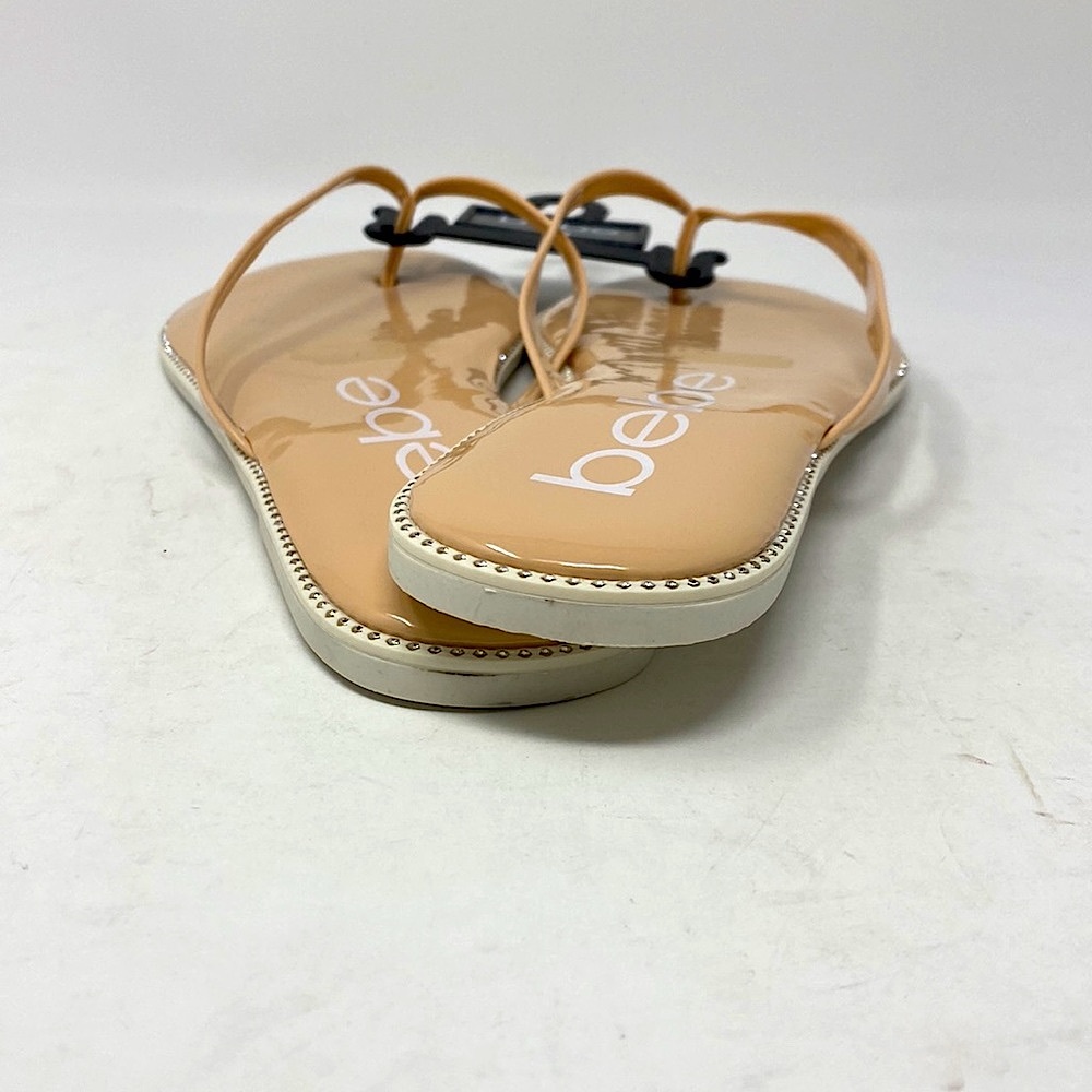 Women's bebe 𝐈𝐥𝐞𝐚𝐧𝐚 Nude Patent  thong sandals - Picture 3 of 4